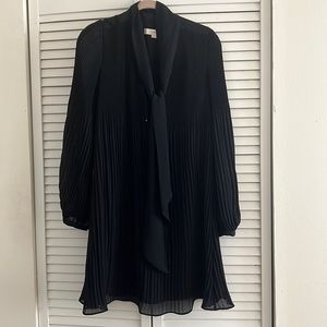 Beautiful long sleeve little black dress.
